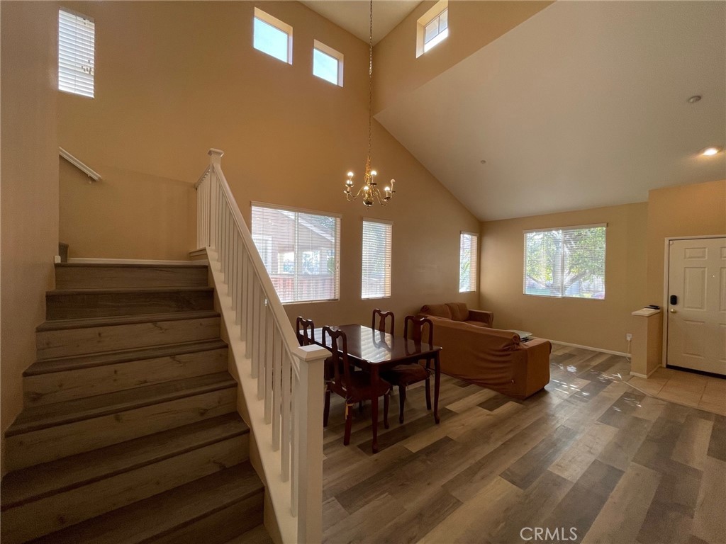 1434 Haddington Drive Riverside, CA 92507 - Photo 22 of 40 a living room with furniture and a wooden floor