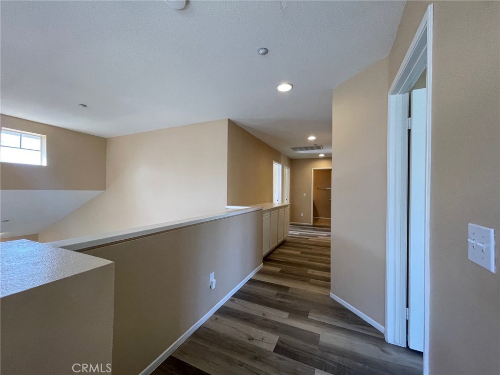 1434 Haddington Drive Riverside, CA 92507 - Photo 23 of 40 a view of a hallway with stairs