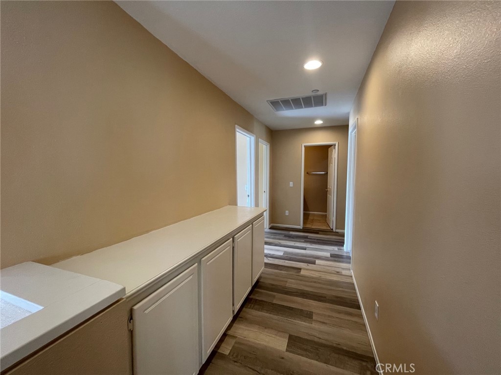 1434 Haddington Drive Riverside, CA 92507 - Photo 31 of 40 a view of a hallway with stairs