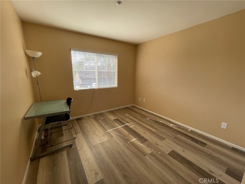 1434 Haddington Drive Riverside, CA 92507 - Photo 34 of 40 a room with a bed and a window