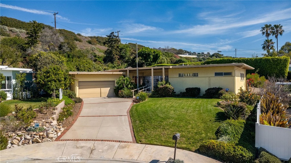 32206 Valor Place Rancho Palos Verdes, CA 90275 - Photo 1 of 1 a front view of a house with a yard