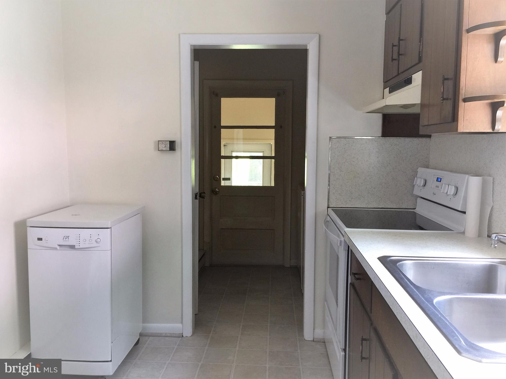 1675 Shookstown Road Frederick, MD 21702 - Photo 6 of 19 a kitchen that has a sink in it
