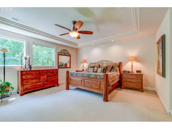 a bedroom with furniture and window