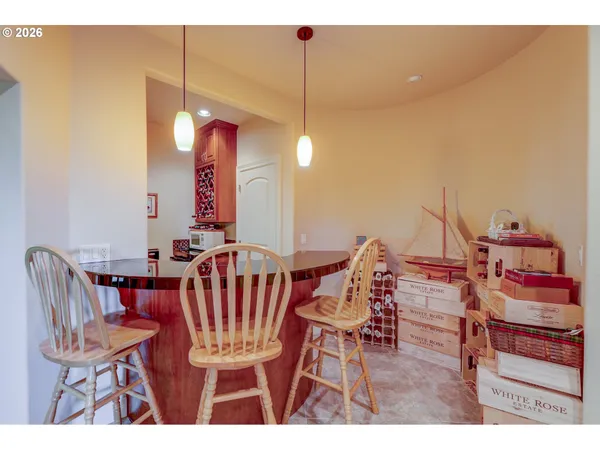 a dining room with furniture and window