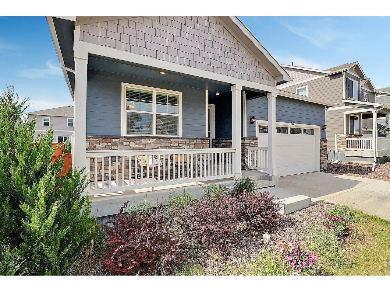 1269 Wild Basin Road Severance, CO 80550 - Photo 3 of 45 Covered front porch with welcoming entry