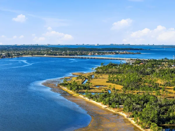a view of a lake with a city