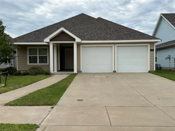 front view of house with a yard