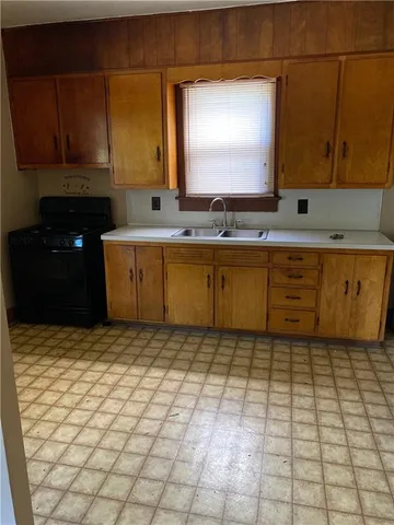 a bathroom with a sink a mirror and a bathtub
