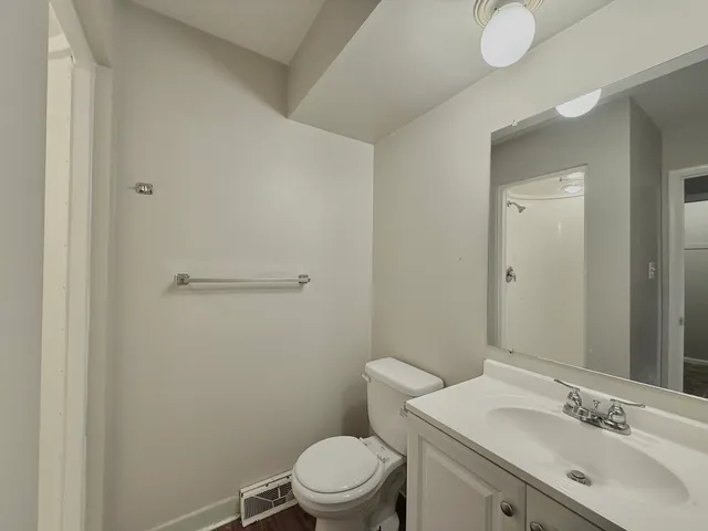 an empty room with a empty space and a window