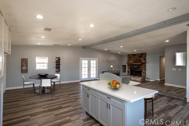 38077 Rabbit Springs Road Lucerne Valley, CA 92356 - Photo 1 of 1 a large kitchen with a table and chairs
