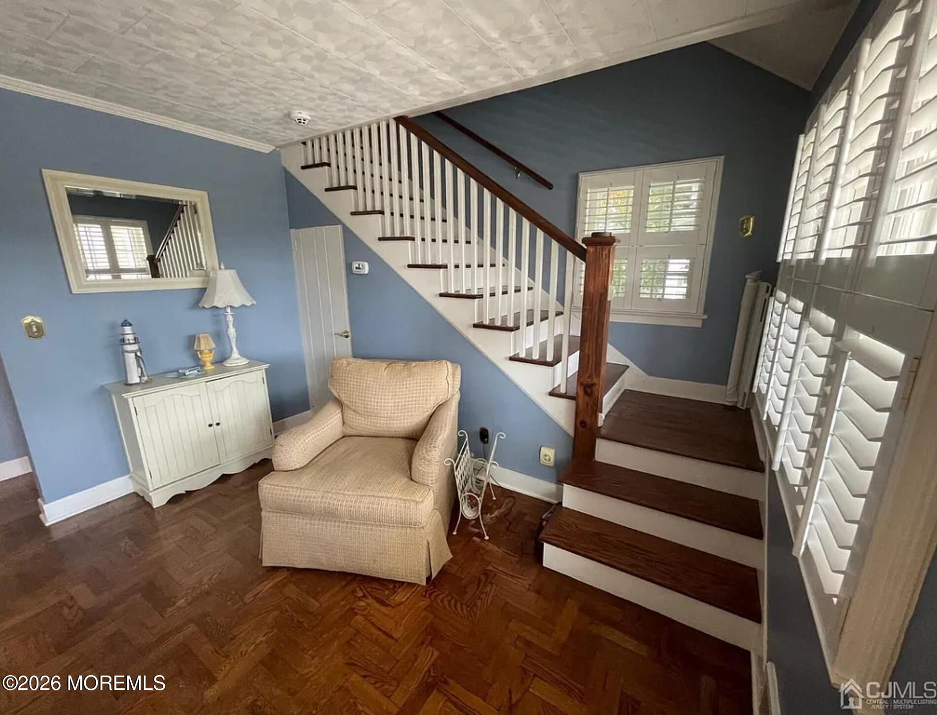 90 Minnesink Road Manasquan, NJ 08736 - Photo 3 of 30 a living room with furniture and a stair