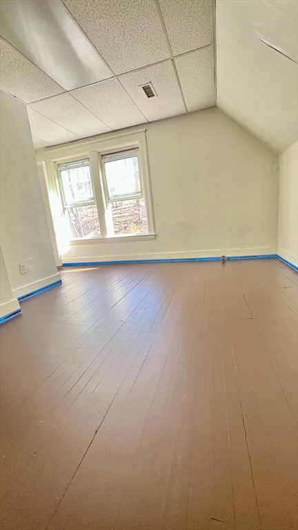 23 Firglade Street, Unit 3 Worcester, MA 01602 - Photo 7 of 12 an empty room with windows