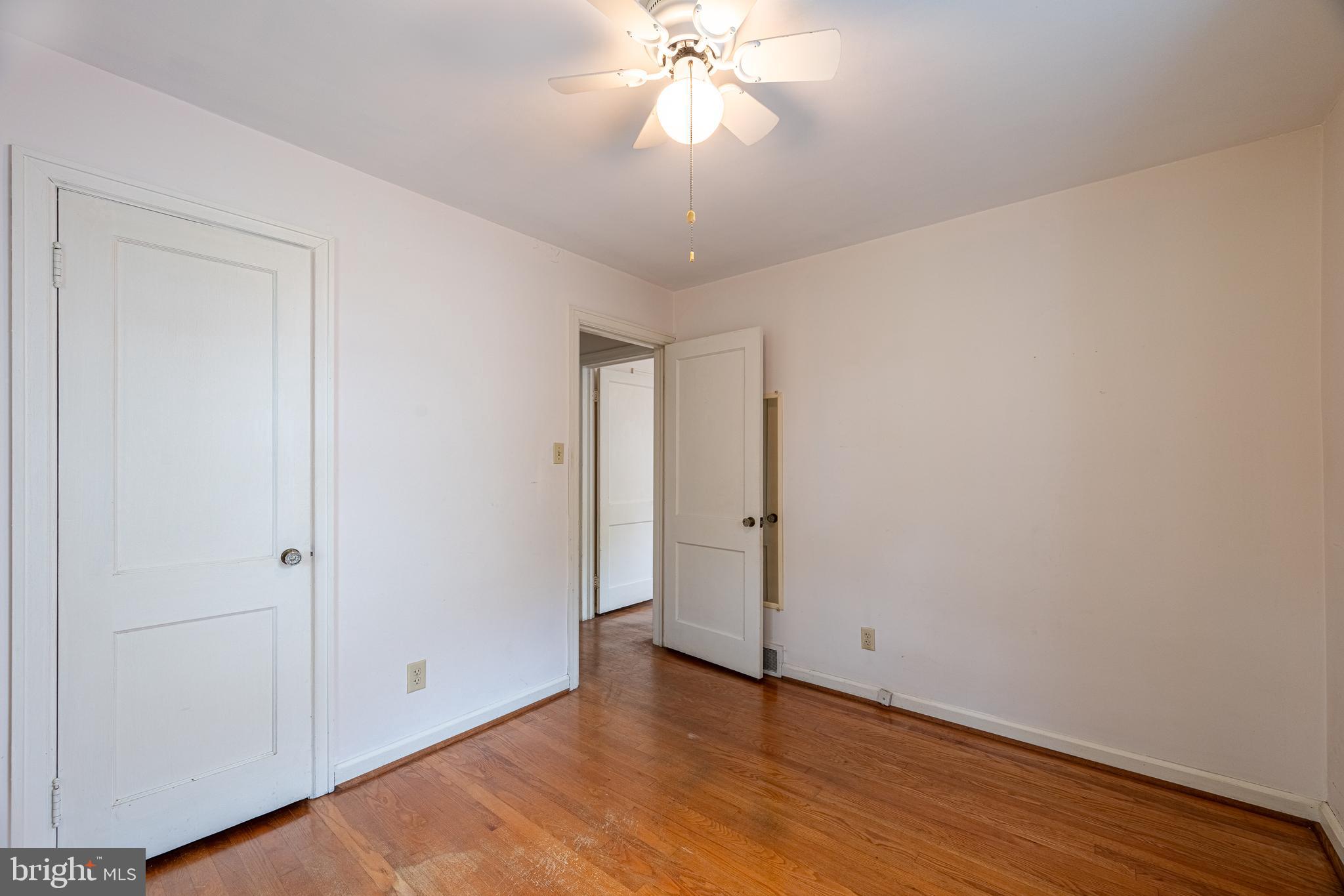2 Norva Avenue Frederick, MD 21701 - Photo 16 of 36 a view of an empty room with wooden floor