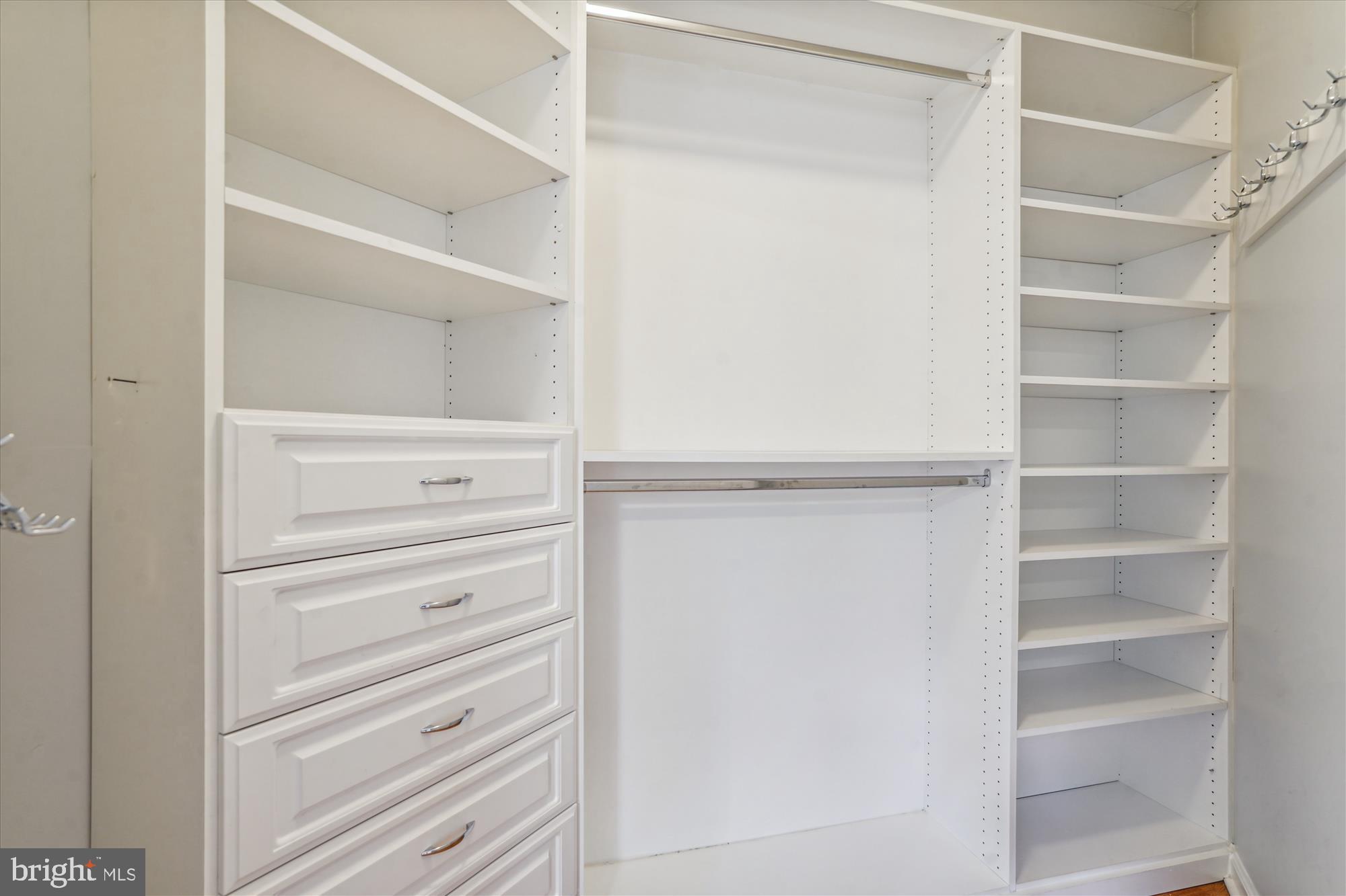 12000 Market Street, Unit 174 Reston, VA 20190 - Photo 15 of 34 Primary Built- in closet