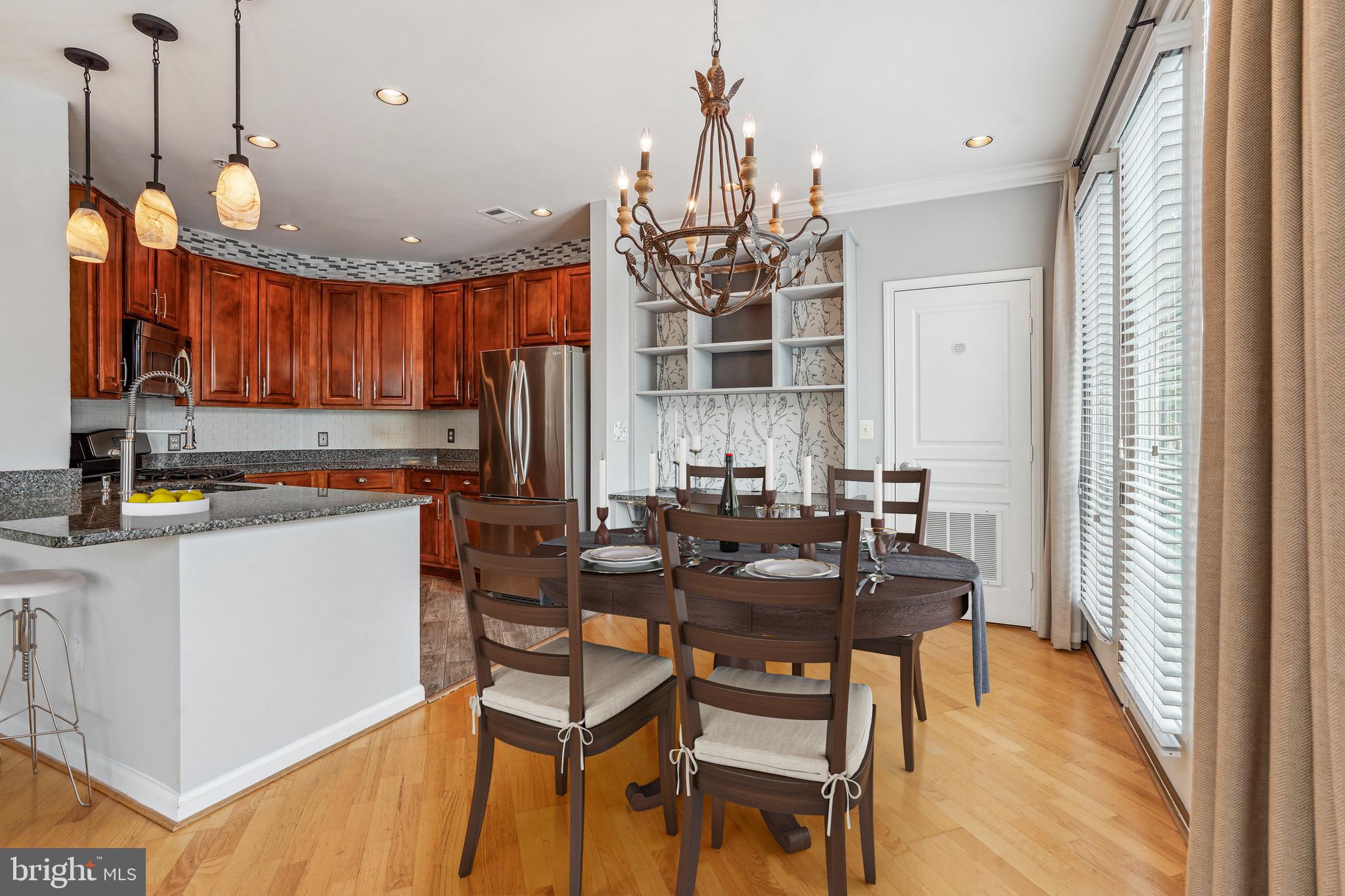 Hardwood floors throughout living and bedrooms
