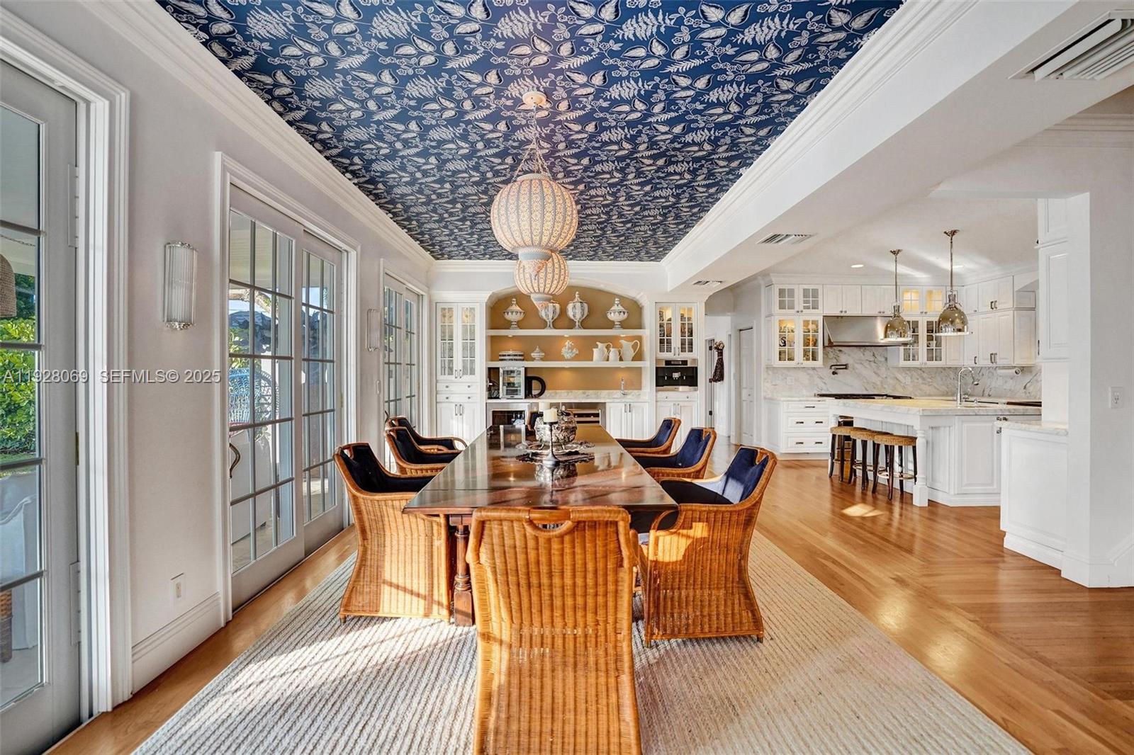 1281 Banyan Road Boca Raton, FL 33432 - Photo 28 of 69 a view of a dining room with furniture window and wooden floor