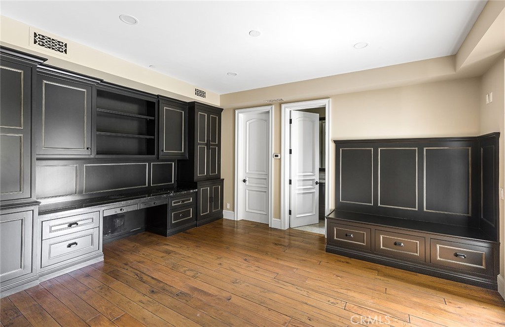 307 Pirate Road Newport Beach, CA 92663 - Photo 15 of 29 a living room with hard wood floors and a flat screen tv