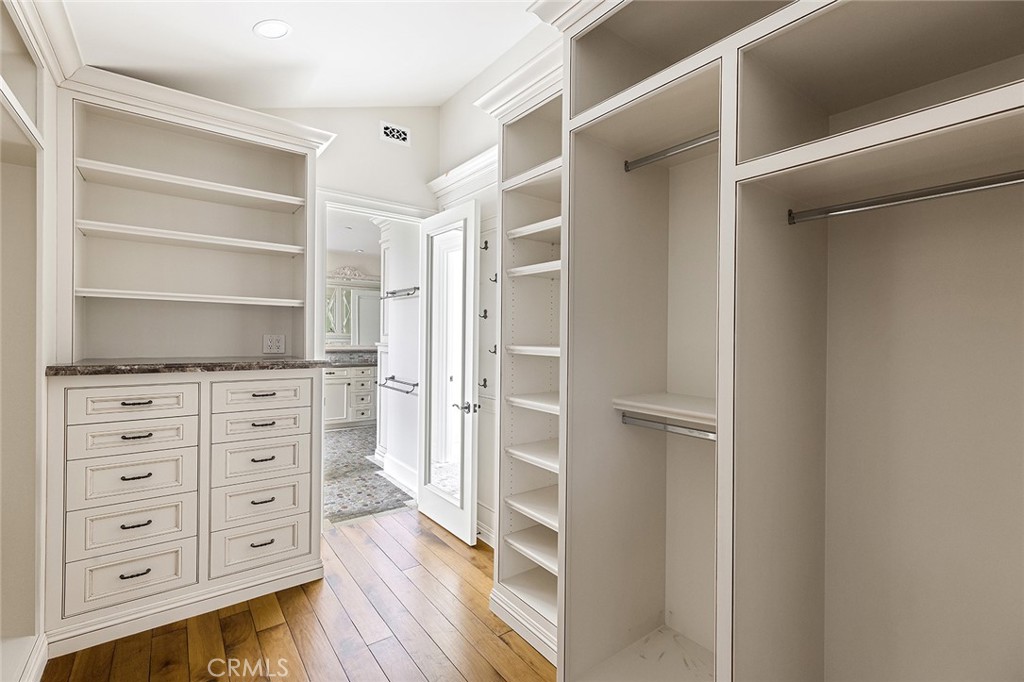 307 Pirate Road Newport Beach, CA 92663 - Photo 28 of 29 a view of walk in closet with empty racks