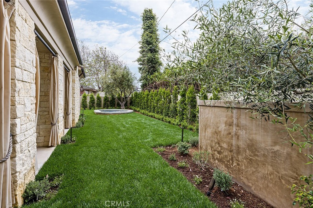 307 Pirate Road Newport Beach, CA 92663 - Photo 29 of 29 a view of a yard from a corridor