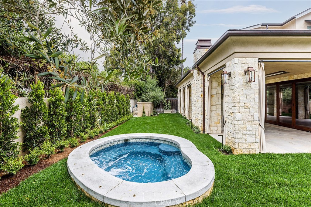 307 Pirate Road Newport Beach, CA 92663 - Photo 10 of 29 a view of a house with a backyard