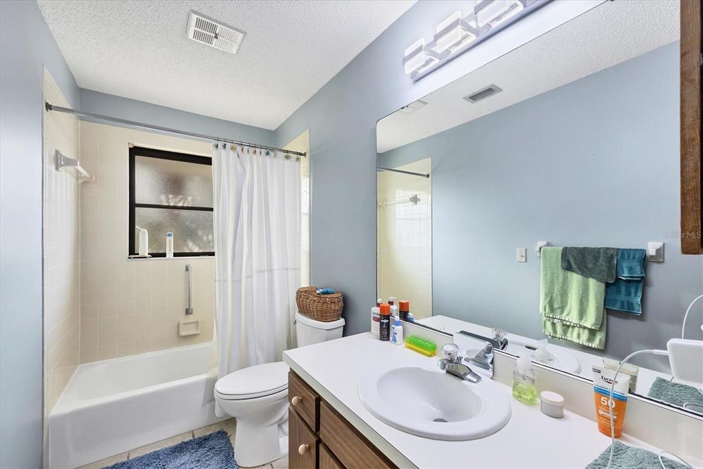 140 Damfino Street Boca Grande, FL 33921 - Photo 24 of 48 a bathroom with a sink toilet and shower