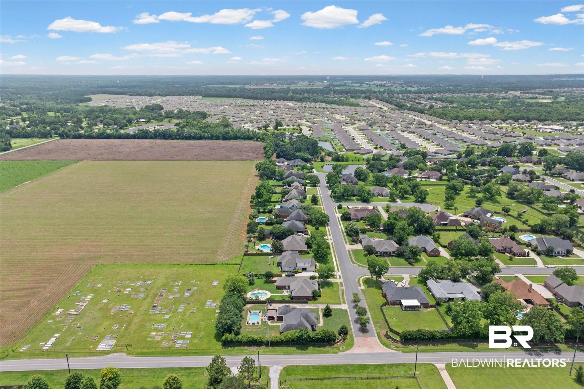 24908 Bosbyshell Avenue Daphne, AL 36526 - Photo 42 of 49 Aerial view showcasing an established residential area bordering open fields