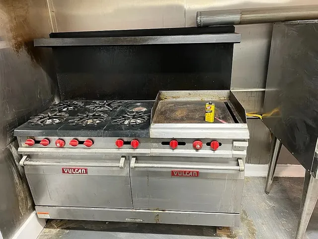 a bathroom with a shower and a toilet