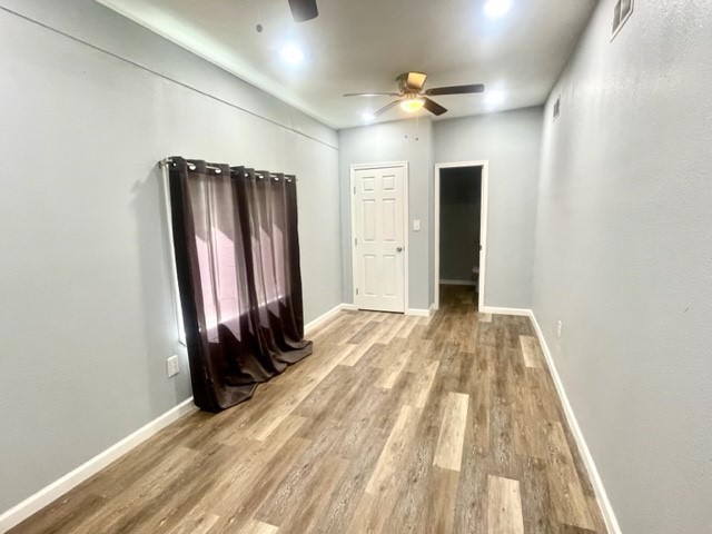 1102 Beech Street Taylor, TX 76574 - Photo 14 of 38 a view of a room with a wardrobe space