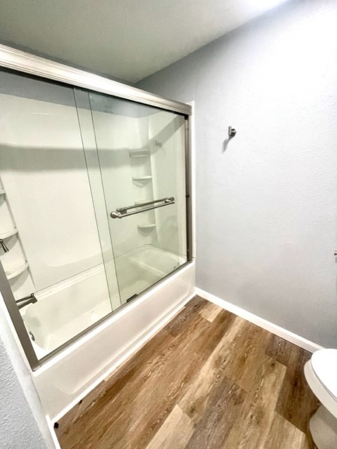 1102 Beech Street Taylor, TX 76574 - Photo 15 of 38 a bathroom with a shower and a toilet