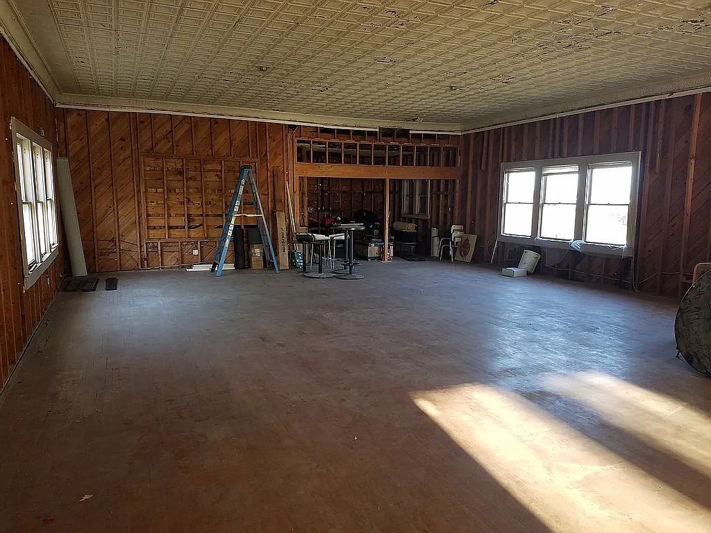 1102 Beech Street Taylor, TX 76574 - Photo 30 of 38 a view of a livingroom with fireplace and window