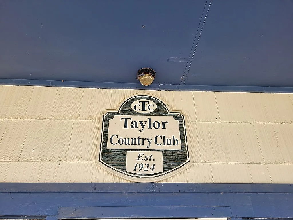 1102 Beech Street Taylor, TX 76574 - Photo 3 of 38 a close up of a sign board