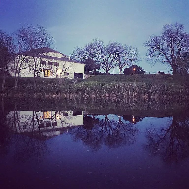 1102 Beech Street Taylor, TX 76574 - Photo 33 of 38 a bench sitting in front of a building