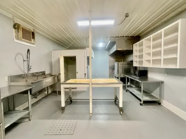 a bathroom with a toilet and a sink