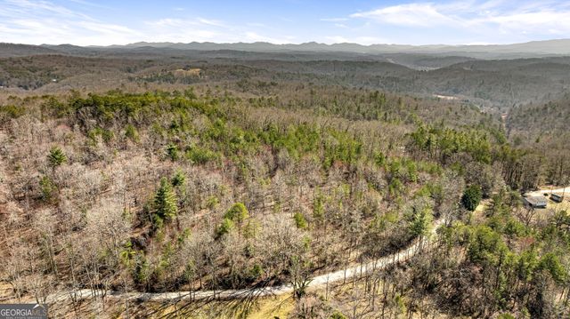 a view of mountain view with mountains in the background