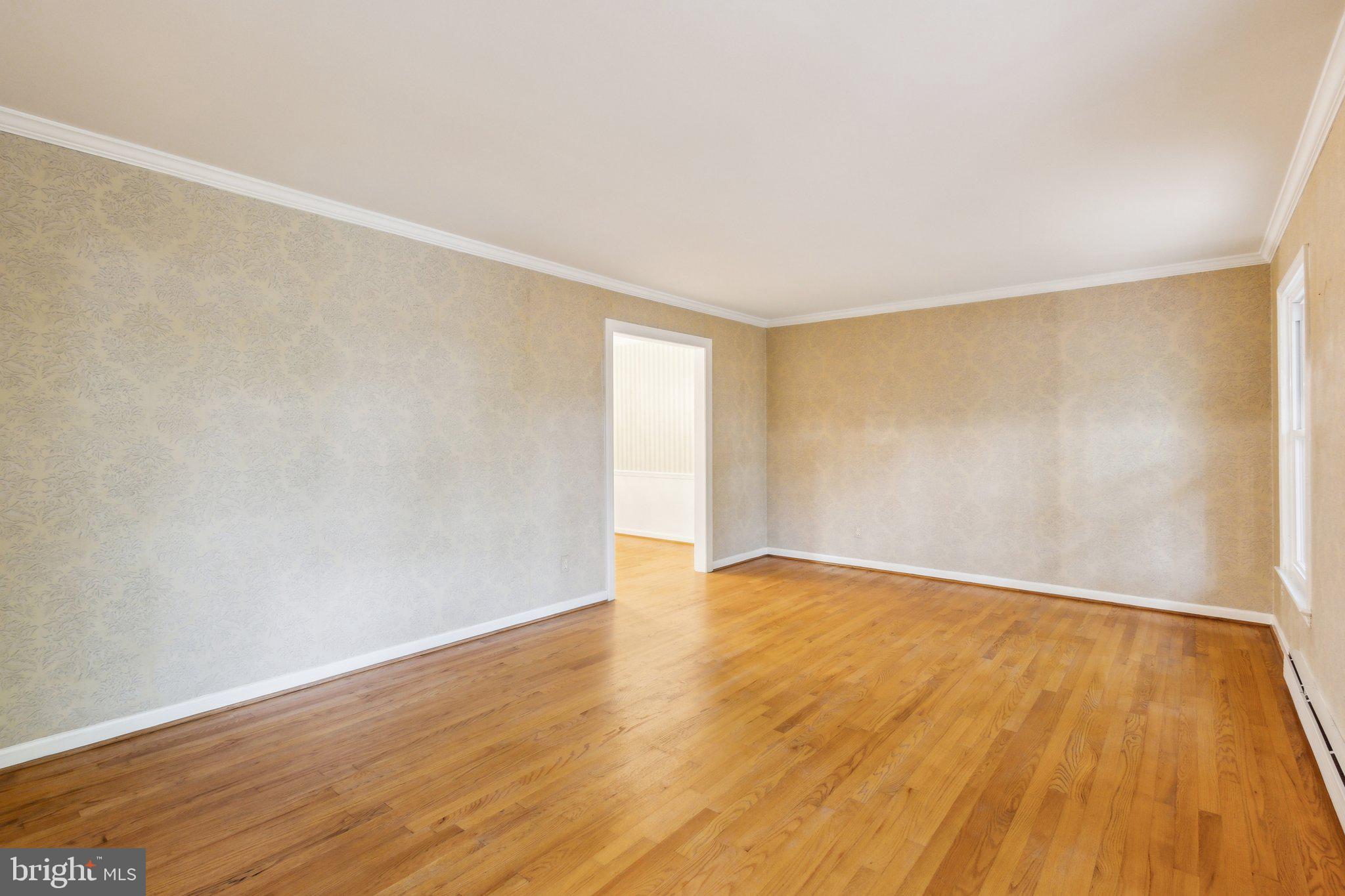 5936 River Drive Lorton, VA 22079 - Photo 11 of 19 a view of an empty room with wooden floor
