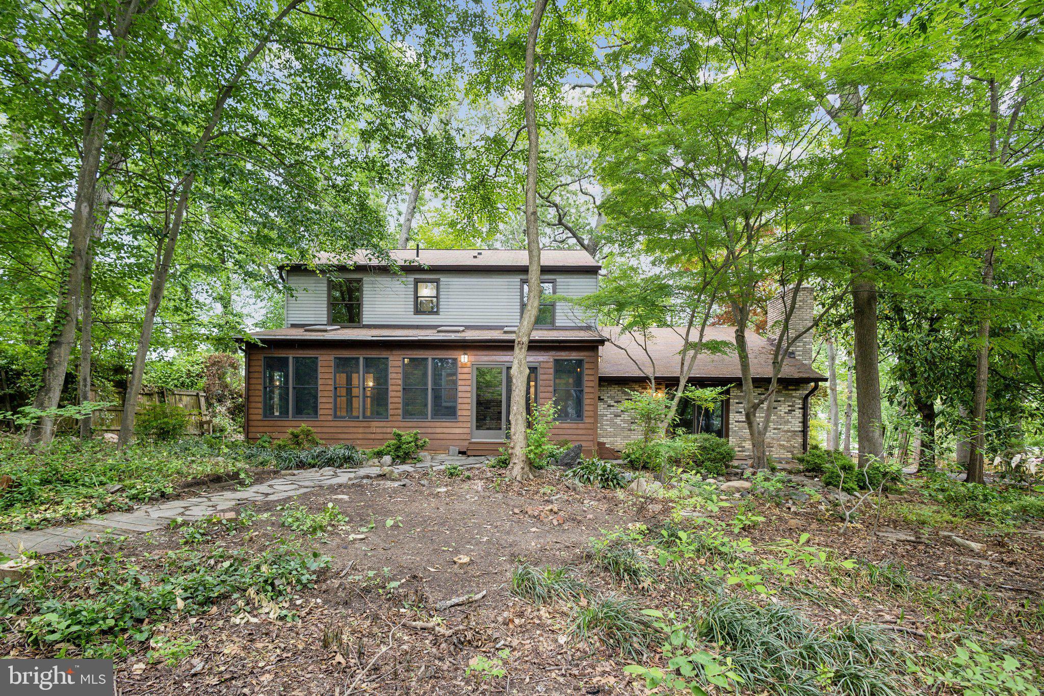 5936 River Drive Lorton, VA 22079 - Photo 16 of 19 a view of a house with yard and a tree