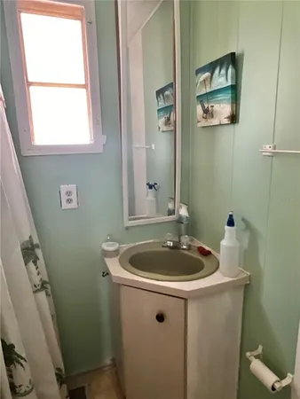 a bathroom with a sink and a toilet