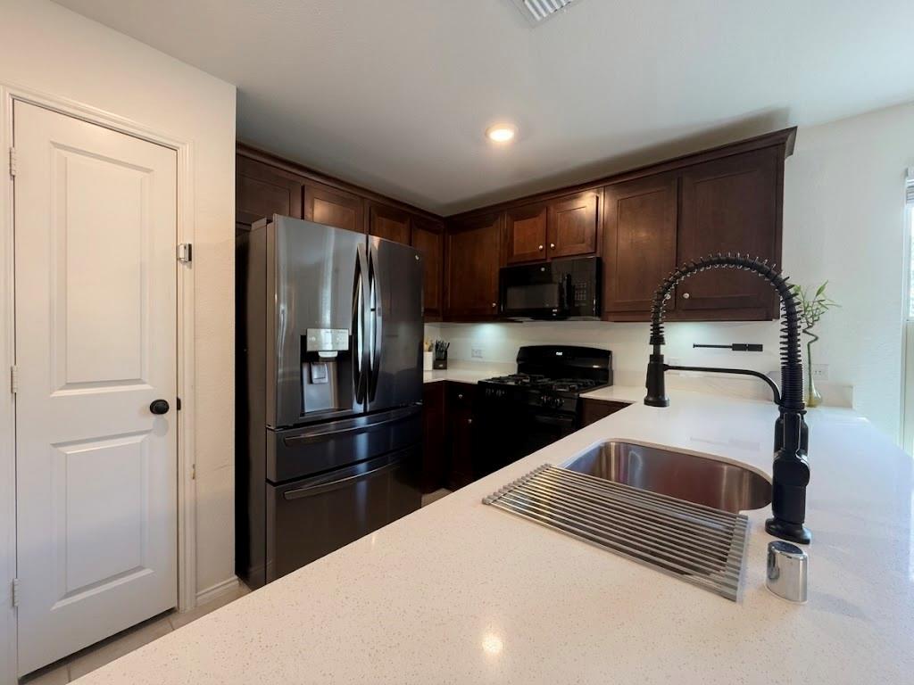 14033 Earlham Street Pilot Point, TX 76258 - Photo 15 of 39 LONG KITCHEN --VIRTUALLY ENHANCED