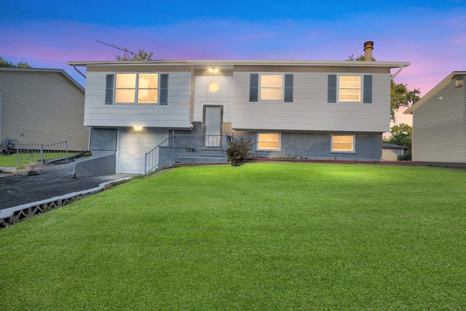 a view of a yard in front of a house