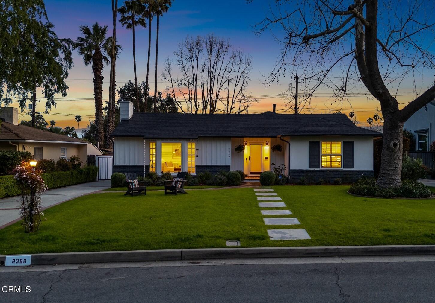 a view of a house with a swimming pool