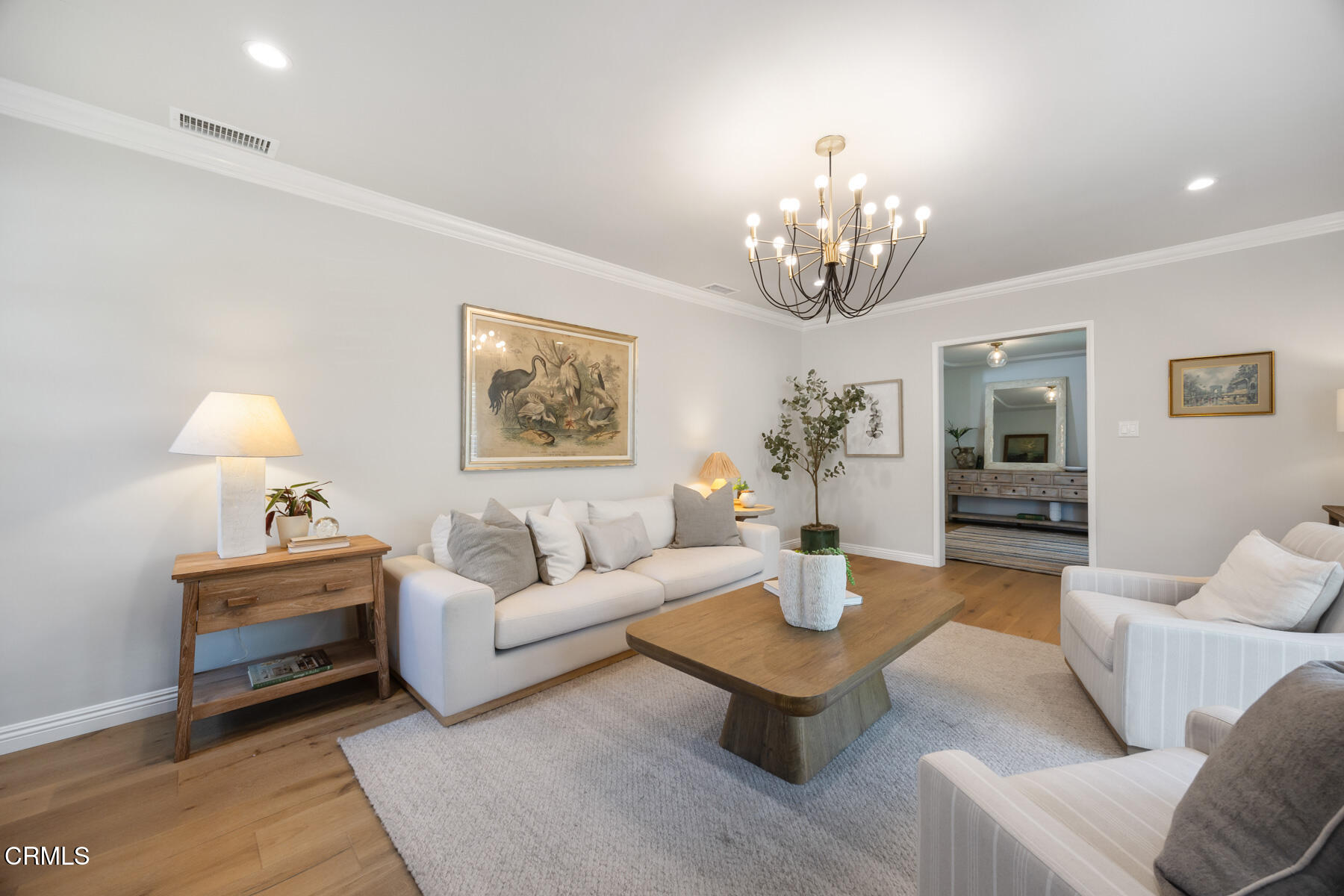 2386 Galbreth Road Pasadena, CA 91104 - Photo 11 of 63 a living room with furniture a chandelier and a table
