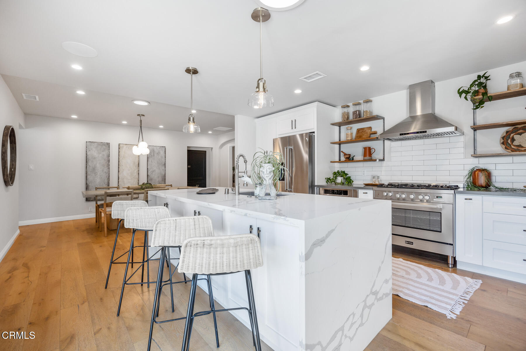 2386 Galbreth Road Pasadena, CA 91104 - Photo 23 of 63 a large white kitchen with lots of counter space and appliances