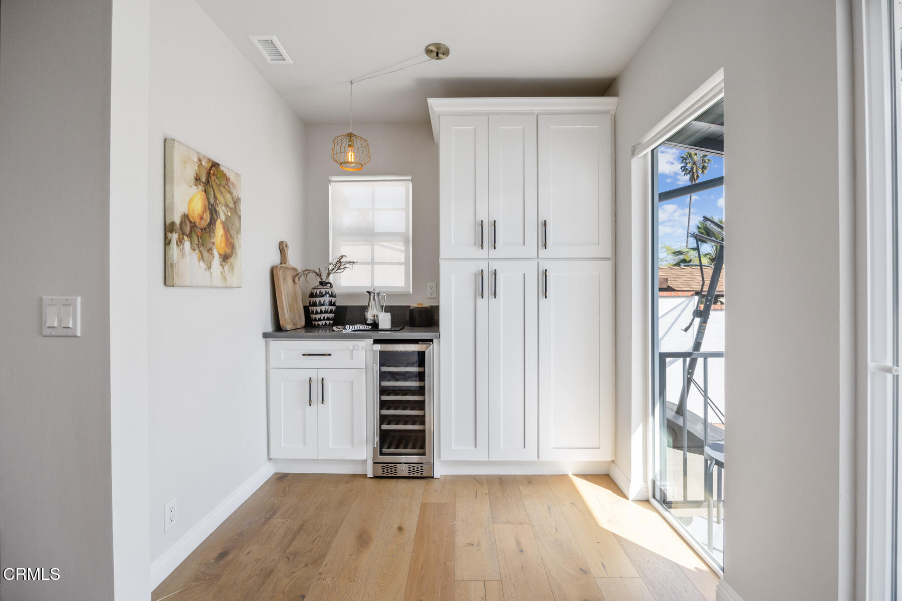 2386 Galbreth Road Pasadena, CA 91104 - Photo 25 of 63 a view of a bedroom with wooden floor and windows
