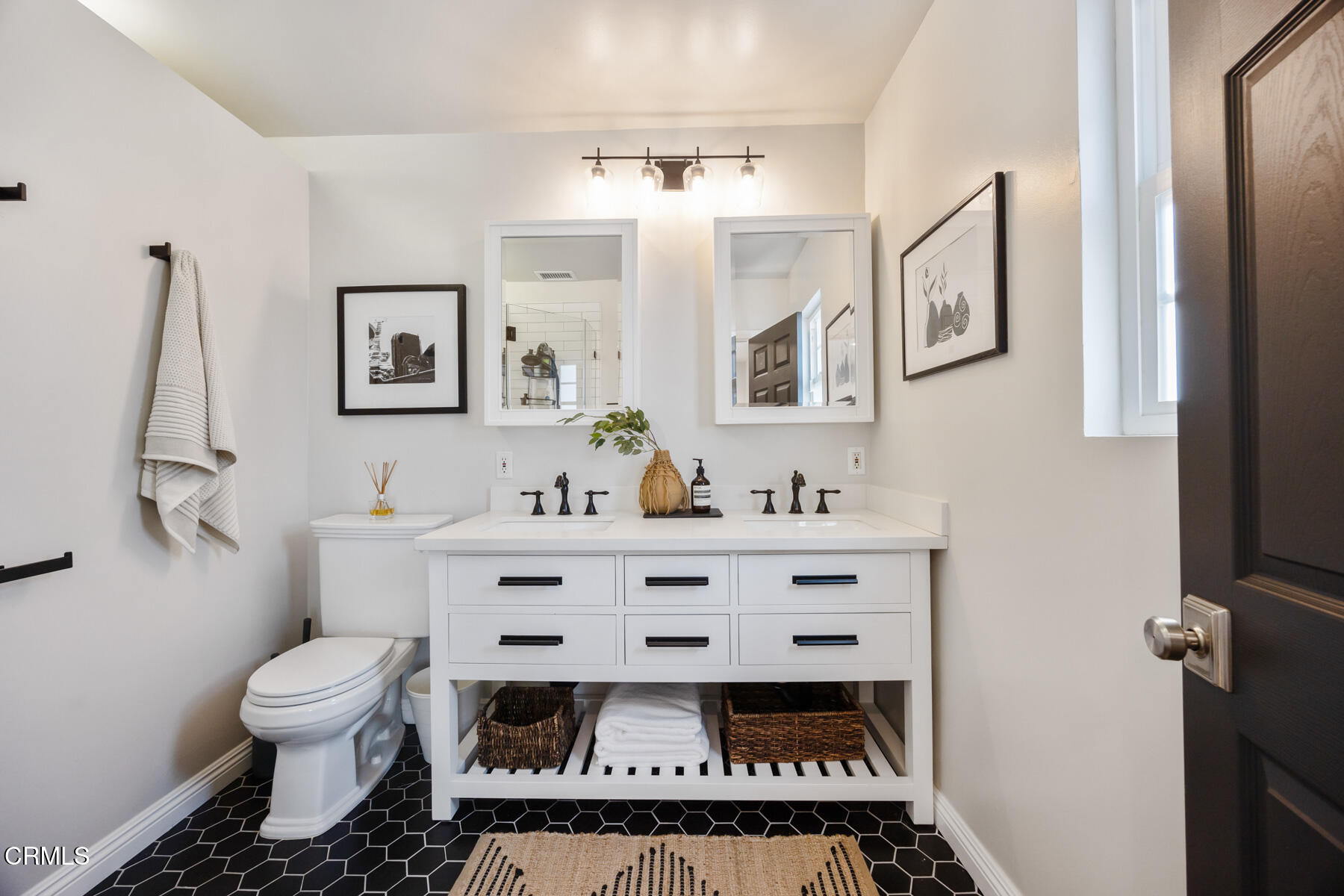2386 Galbreth Road Pasadena, CA 91104 - Photo 28 of 63 a bathroom with a sink toilet and mirror