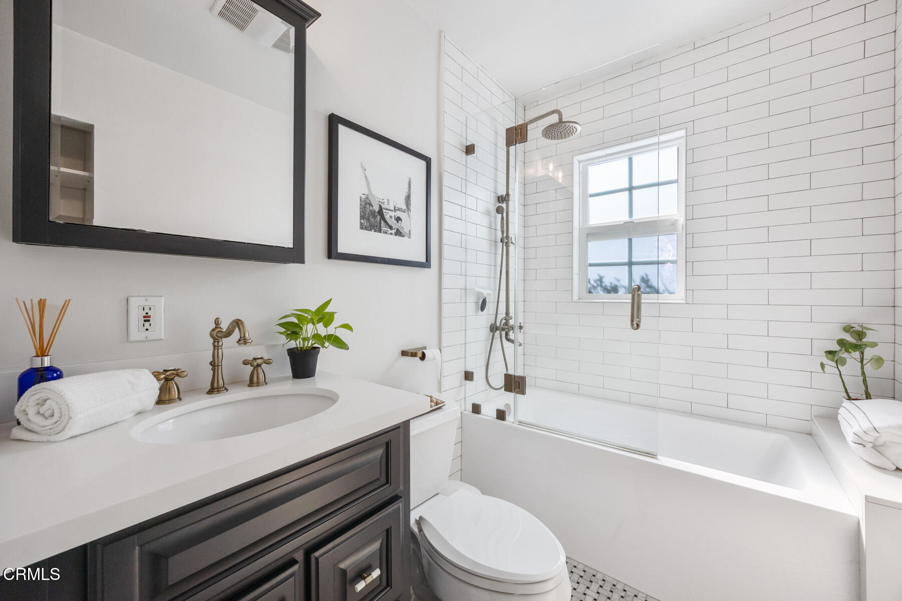2386 Galbreth Road Pasadena, CA 91104 - Photo 40 of 63 a bathroom with a sink a toilet and bathtub