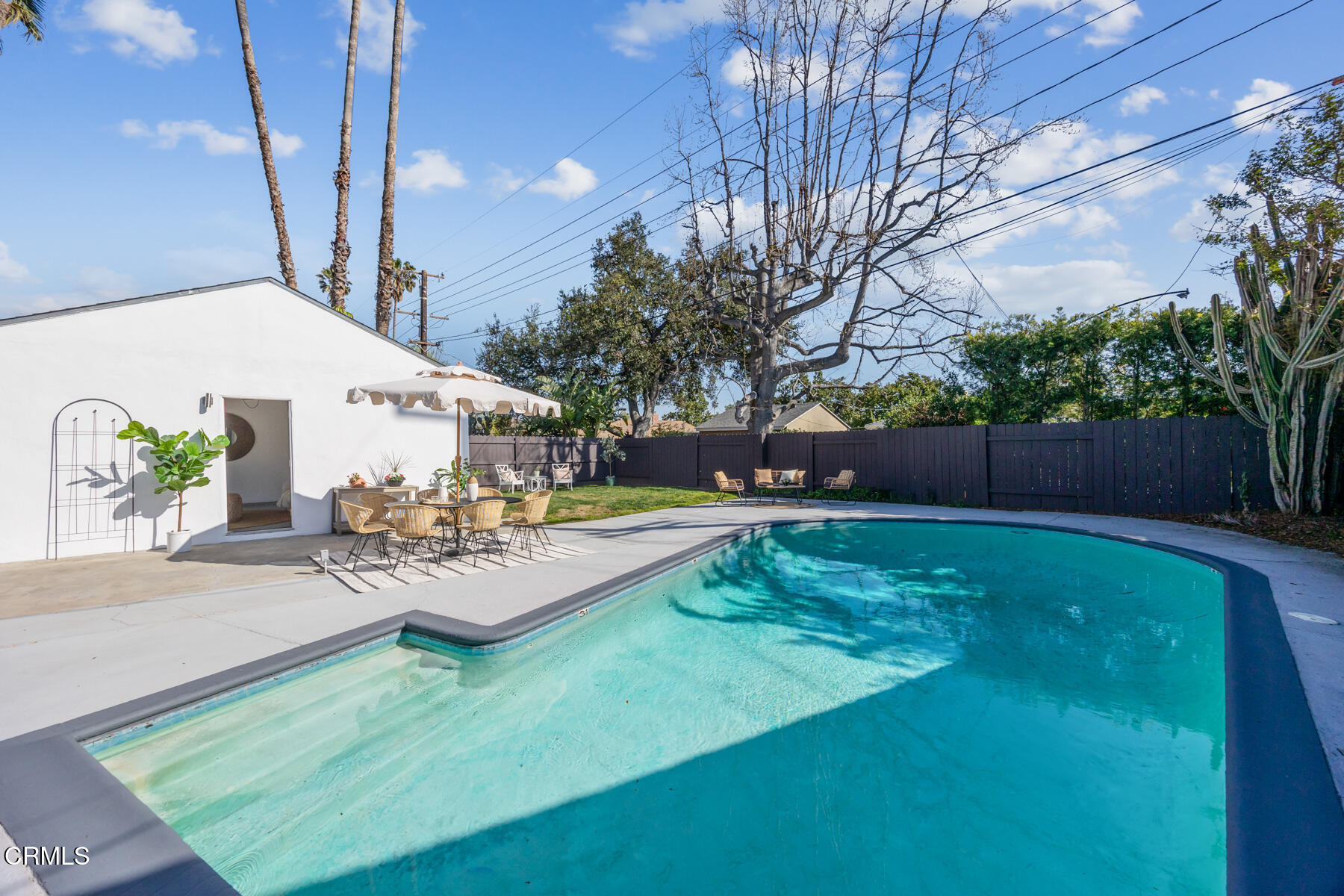 2386 Galbreth Road Pasadena, CA 91104 - Photo 52 of 63 a view of a backyard with couches plants and large tree