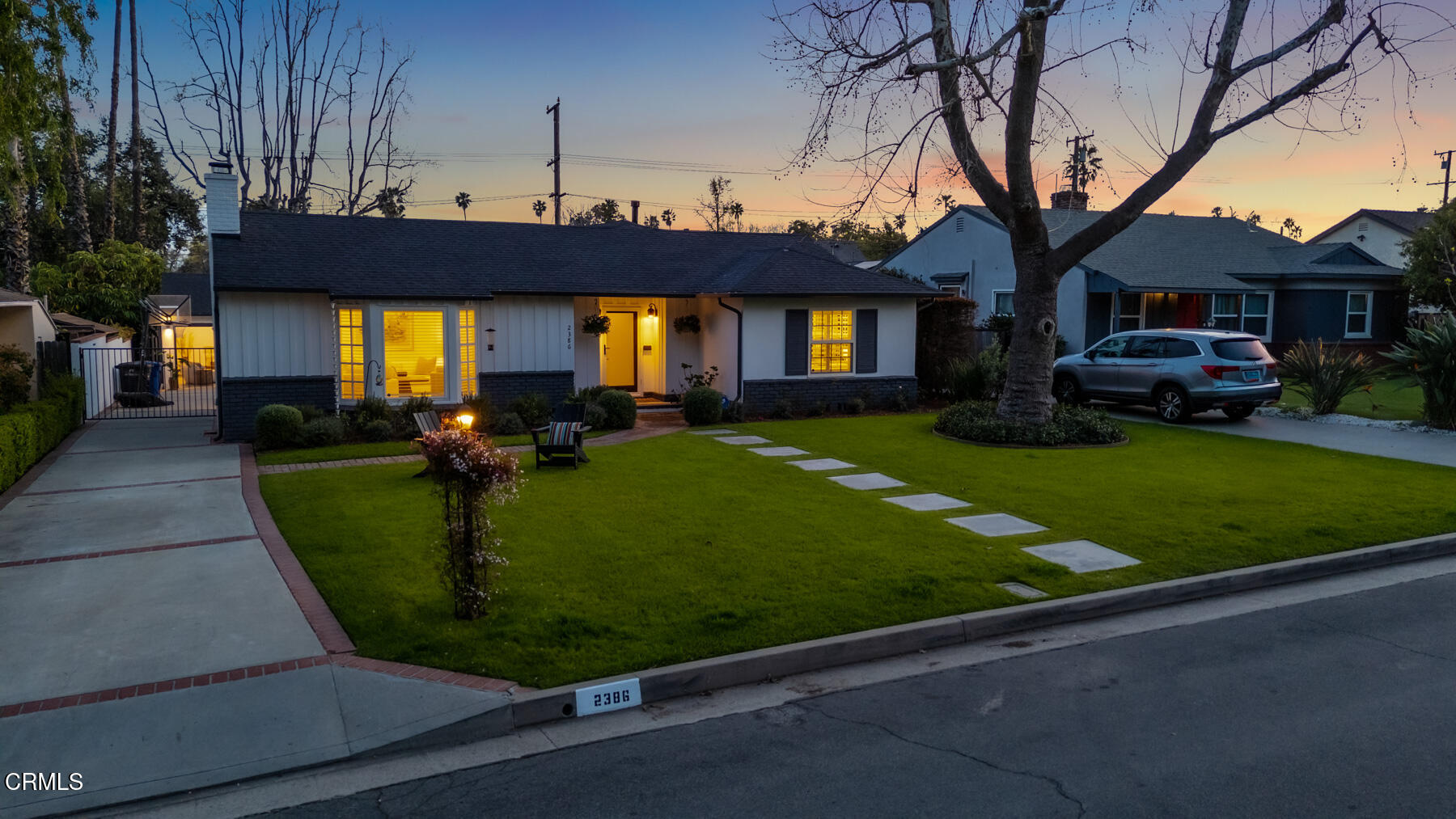 2386 Galbreth Road Pasadena, CA 91104 - Photo 62 of 63 a view of a big house with a big yard plants and large trees