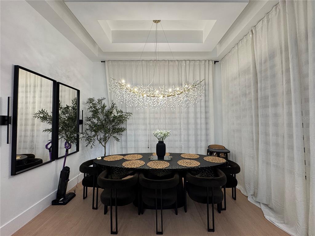 17314 Highway 41 Spring Hill, FL 34610 - Photo 15 of 54 a view of a dining room with furniture and window