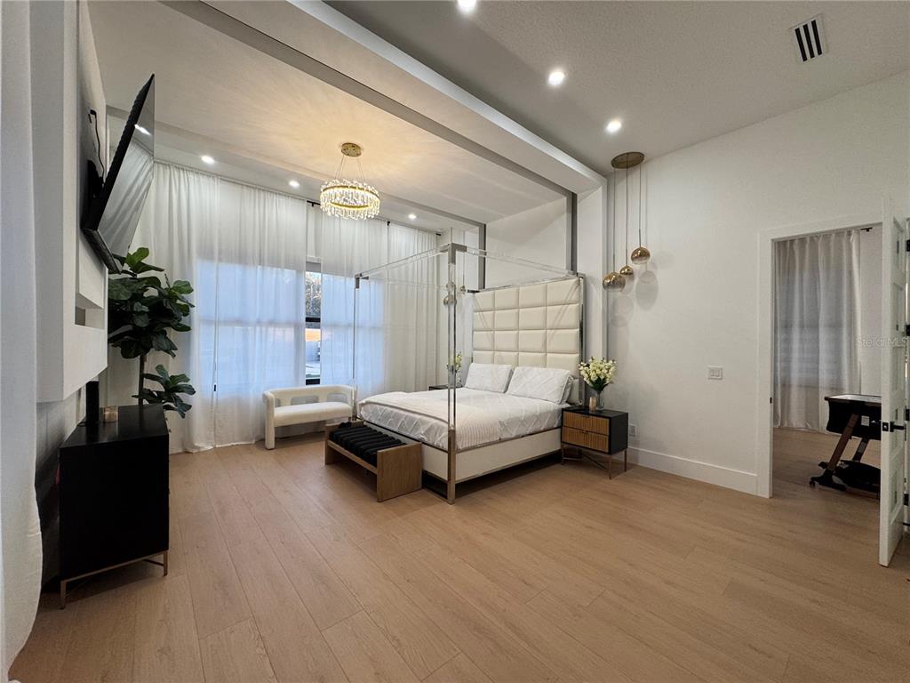 17314 Highway 41 Spring Hill, FL 34610 - Photo 20 of 54 a living room with furniture and a flat screen tv