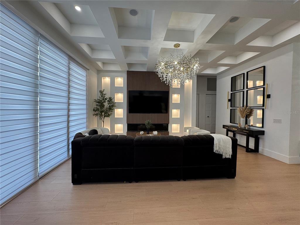 17314 Highway 41 Spring Hill, FL 34610 - Photo 6 of 54 a living room with furniture and a flat screen tv